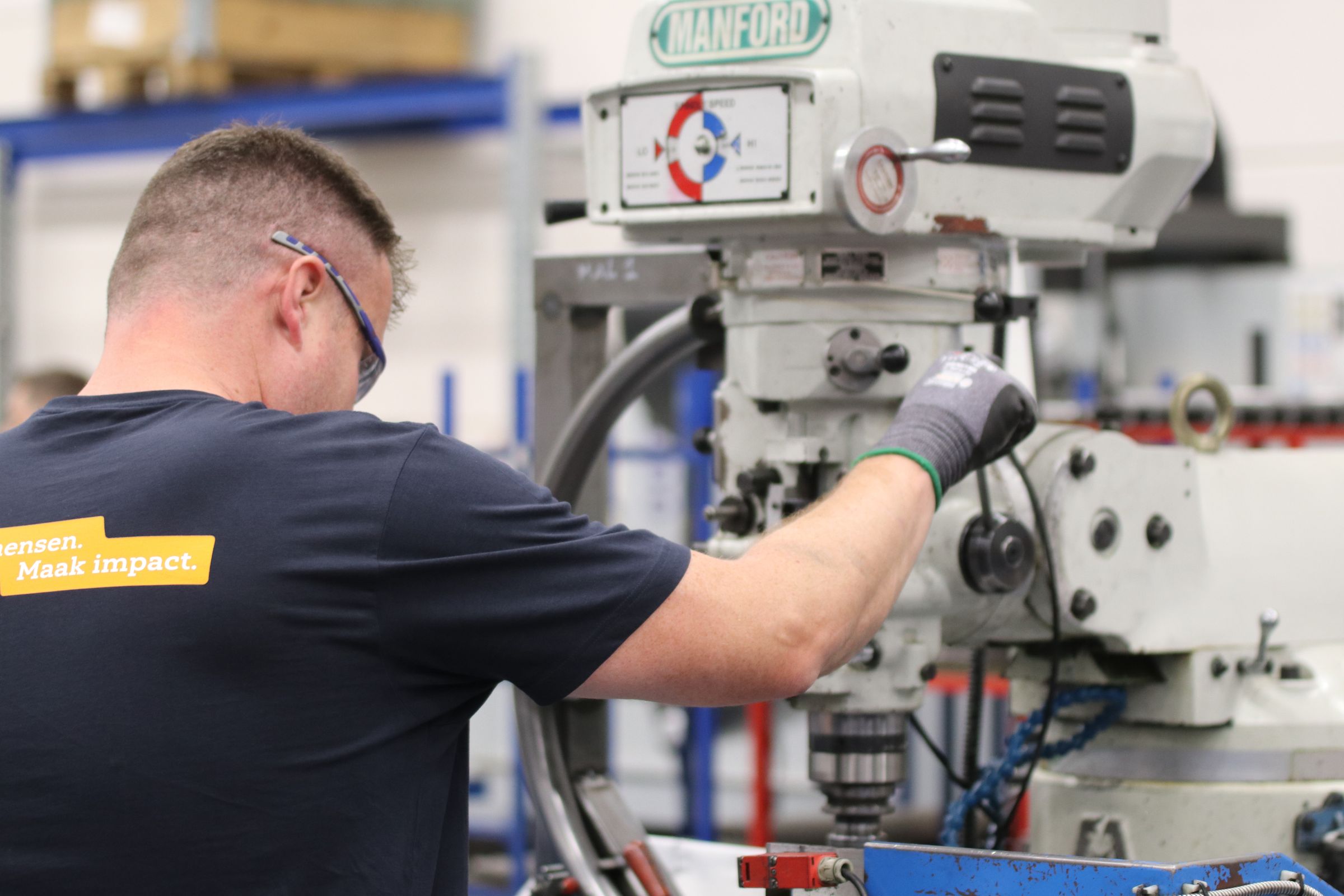 Manufacturing operator at a CNC milling station